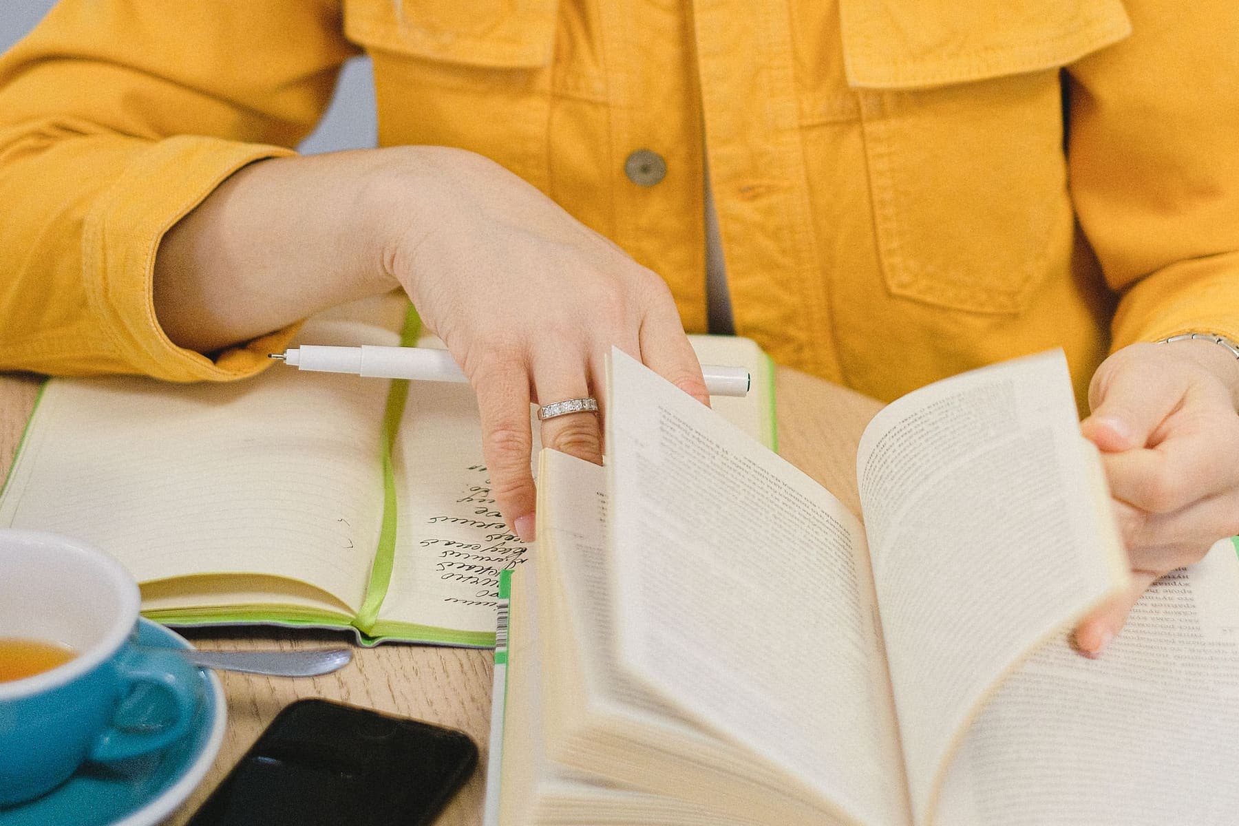 Student making notes while preparing for an exam